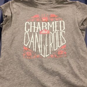 Nike girls M "Charmed and Dangerous" shirt